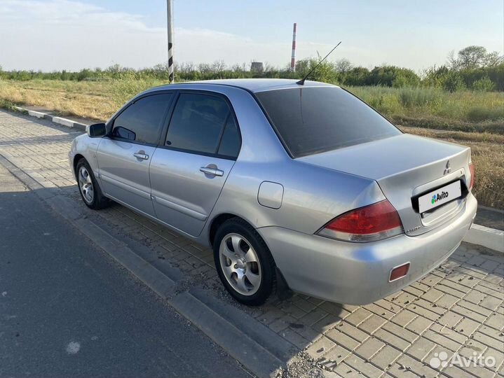 Mitsubishi Lancer 1.6 МТ, 2005, 200 000 км
