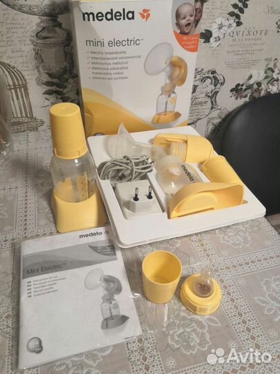 Молокоотсос medela электрический