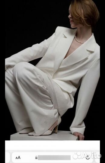 Дизайнерский костюм новый