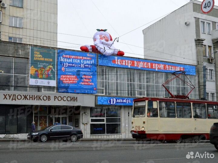 Надувная голова Деда Мороза на крышу