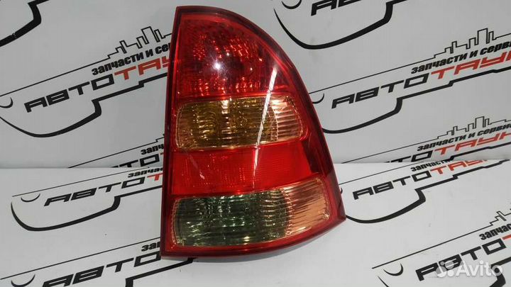 Фонарь toyota corolla fielder CE121G NZE121G NZE12