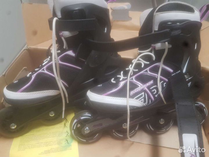 Роликовые коньки