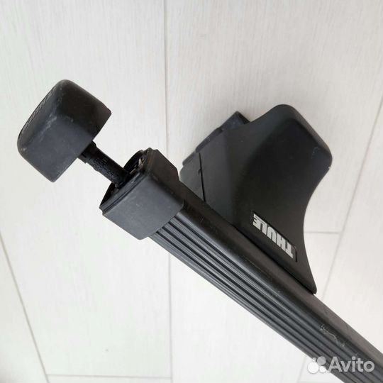 Дуги багажника и крепление лыж thule