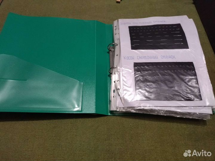 Папка с различными образцами швов