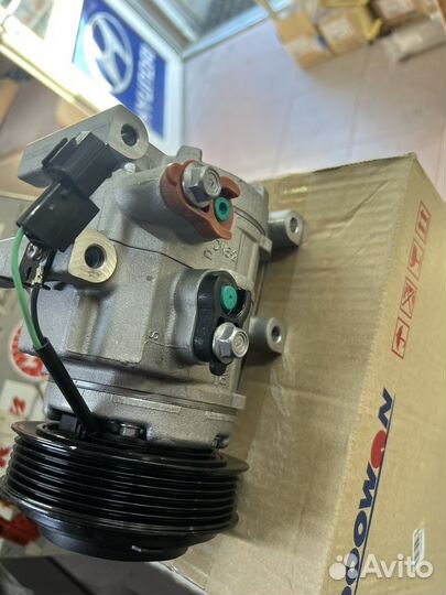 Компрессор кондиционера 97701-4L000