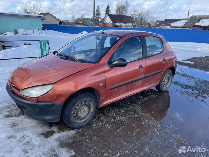 Дверь левая peugeot 206