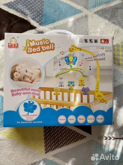 Музыкальный мобиль на кроватку