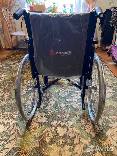 Инвалидная коляска