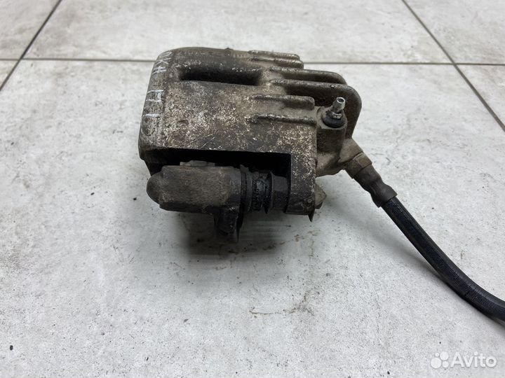 Тормозной суппорт передний левый ваз (LADA) Ока