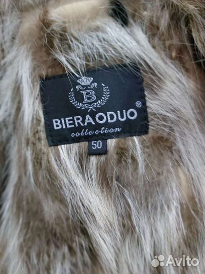 Мужская кожаная куртка с мехом волка