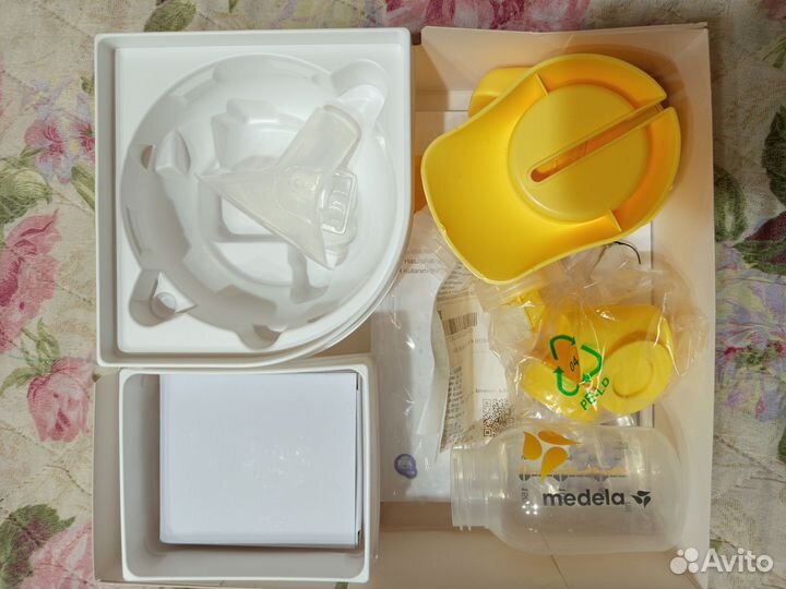 Молокоотсос medela электрический