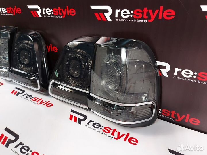 Стопы Toyota Land Cruiser 100 дымчатые T1826