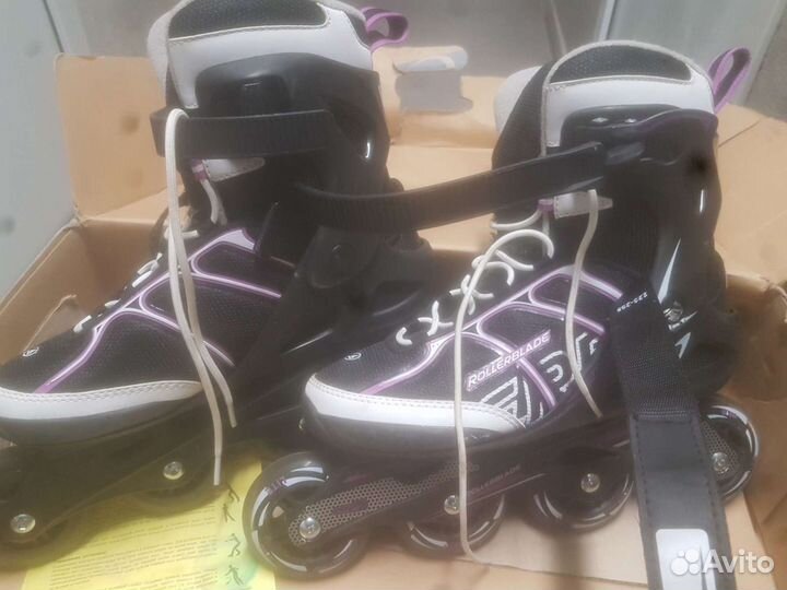 Роликовые коньки