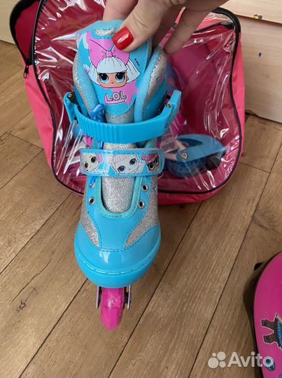 Роликовые коньки