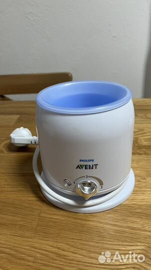 Молокоотсос ручной новый и подогреватель бутылочки