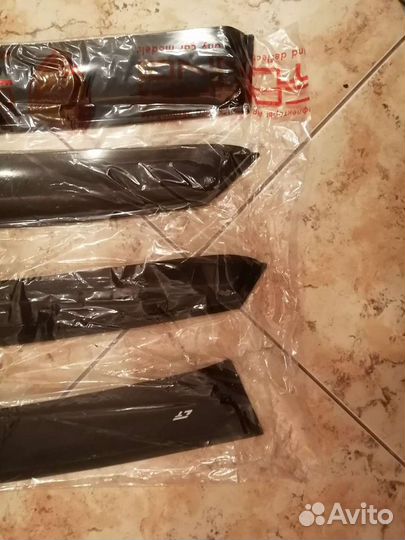 Дефлекторы на машину Лада Веста