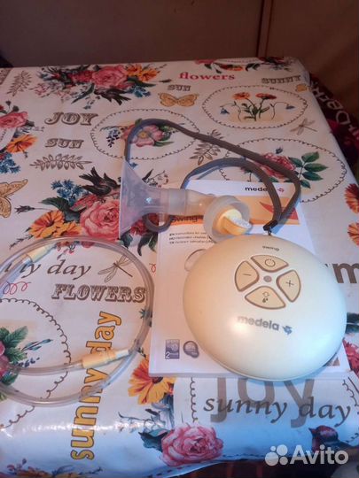 Молокоотсос medela swing электрический