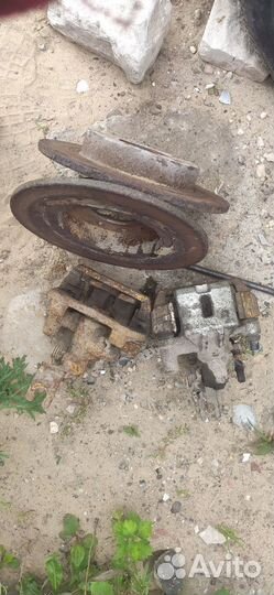 Суппорт тормозной задний Мазда 626 GE 1997