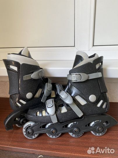 Роликовые коньки