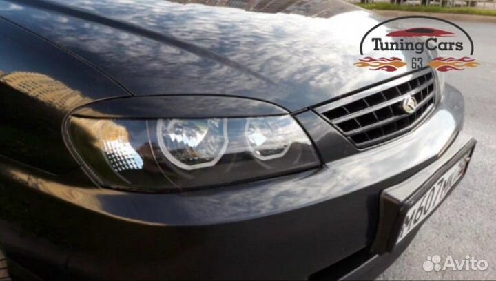 Реснички на фары KIA Spectra F 1