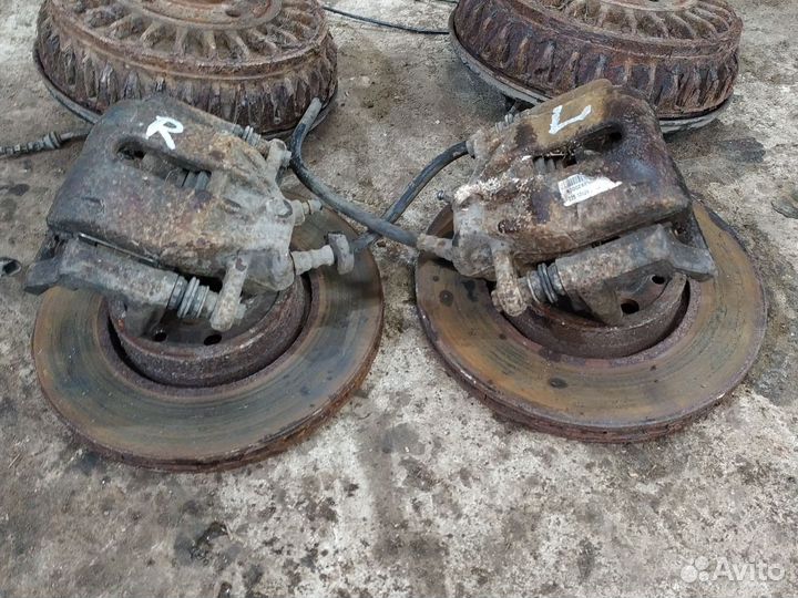 Передние тормозные суппорта Ниссан Альмера G15