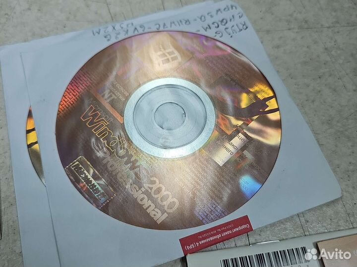Windows 2000Pro 29наклеек 23диска 7конвертов