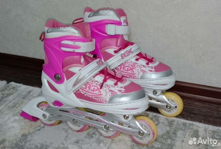 Роликовые коньки
