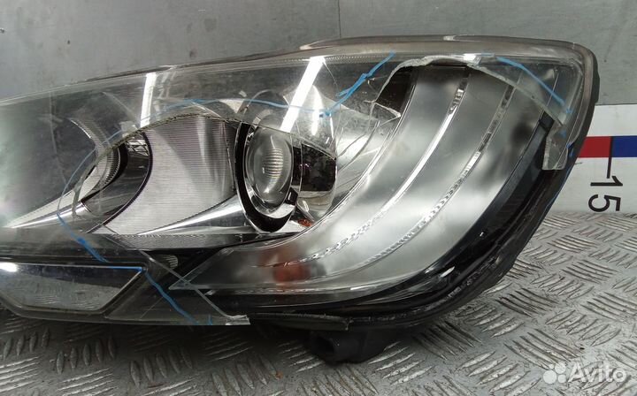 Фара левая Skoda Superb
