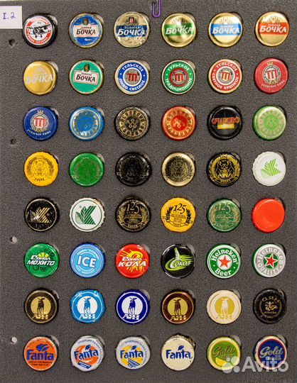 Коллекция пивных пробок 495 штук в альбомах