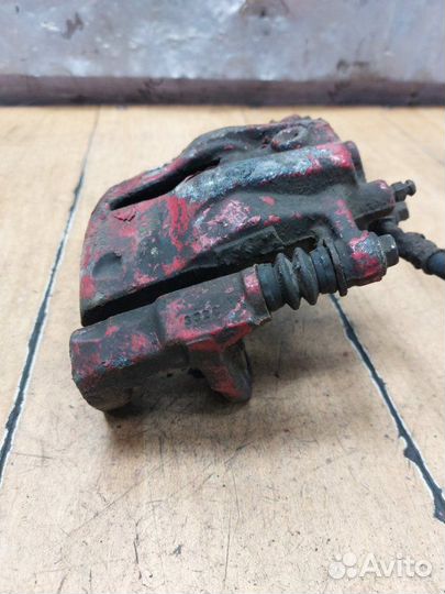 Тормозной суппорт передний левый Opel Combo Z14XEP