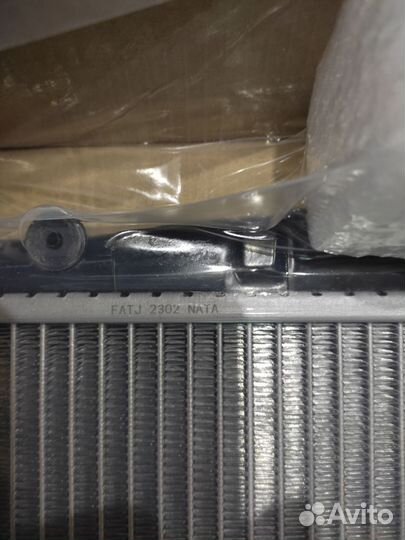 Радиатор охлаждения на nissan note 2008год