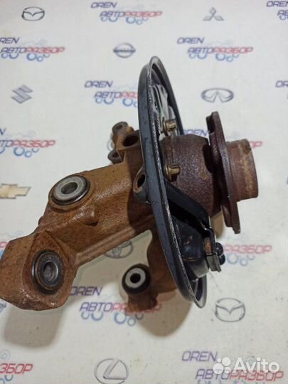 Кулак поворотный задний левый Nissan Terrano D10