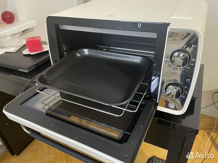 Мини-печь DeLonghi новая