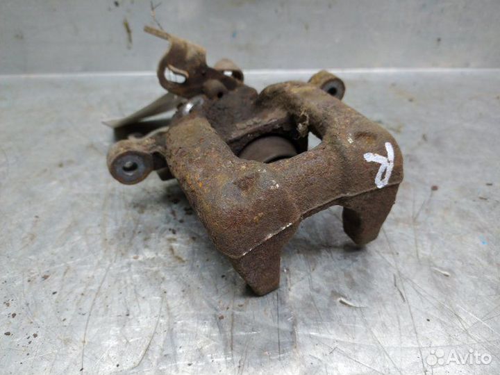 Суппорт тормозной задний правый Skoda Octavia (A5