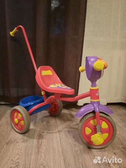Трехколесный велосипед с ручкой