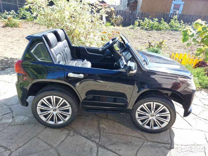 Детский электромобиль двухместный