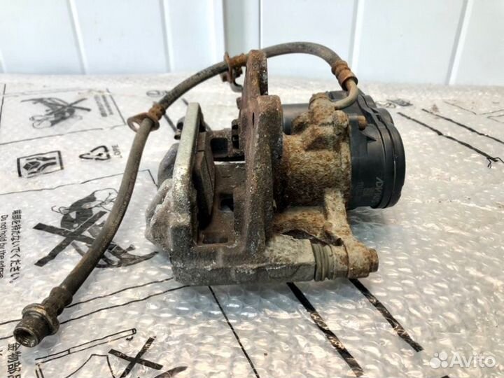 Суппорт тормозной задний левый Lexus Rx 4