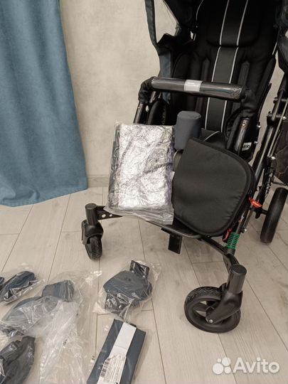 Детская инвалидная коляска для детей дцп
