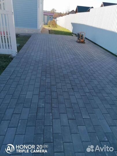 Укладка тротуарной плитки брусчатки