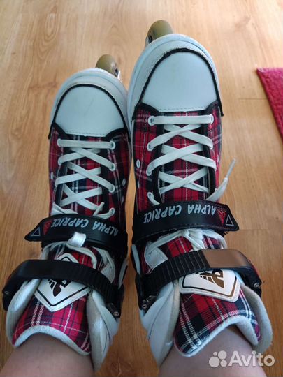 Роликовые коньки