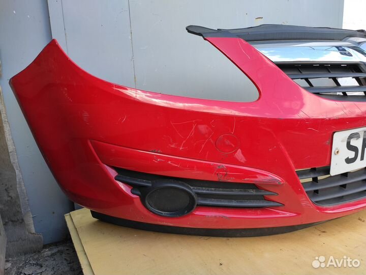 Бампер передний на Opel Corsa D Дорестайлинг