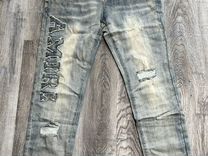 Рваные джинсы Amiri