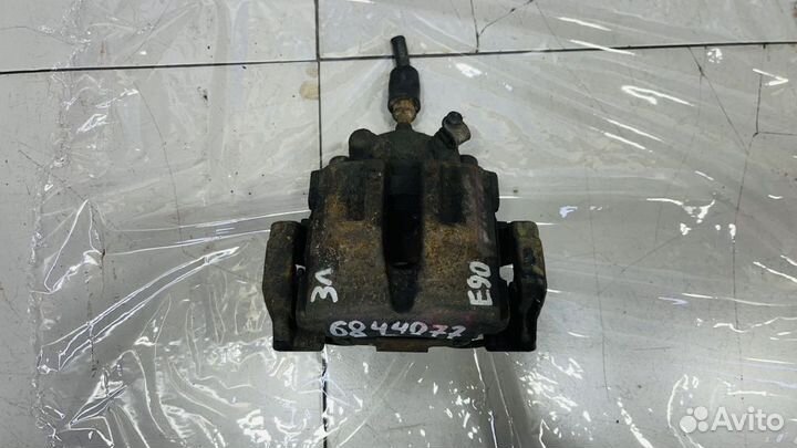 Суппорт задний левый