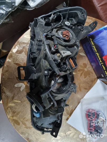 Фара левая на митсубиси lancer 10