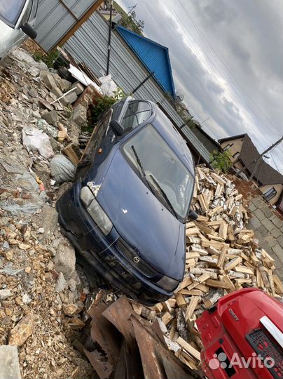 Капот mazda 323