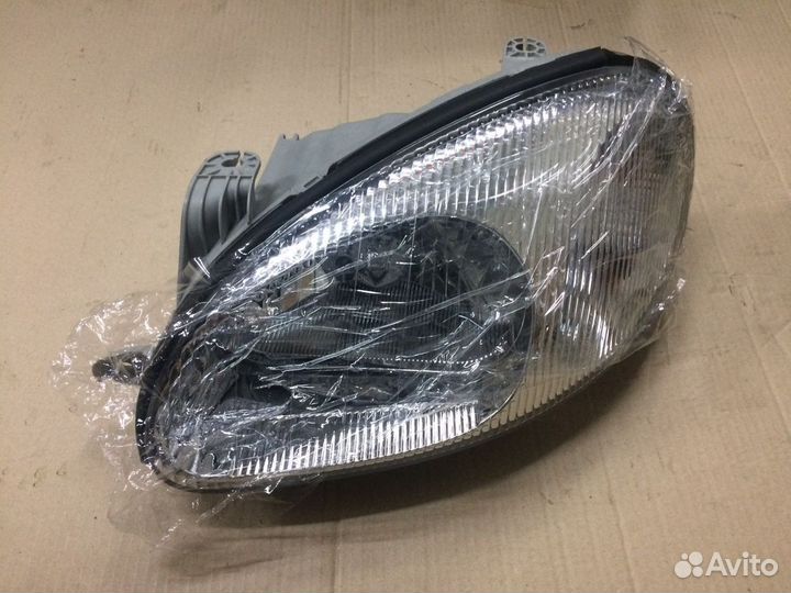 Фара левая Chevrolet Lanos механический корректор