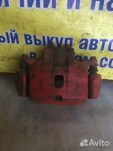 Суппорт тормозной передний левый Mitsubishi Galant