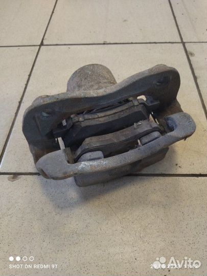 Суппорт тормозной передний левый Kia Rio 4