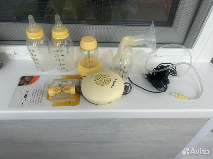 Молокоотсос medela электрический