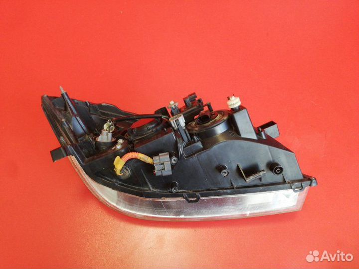Фара левая Nissan Primera